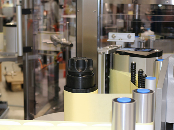 Illustrative example of bottle labeling equipment from Google Search